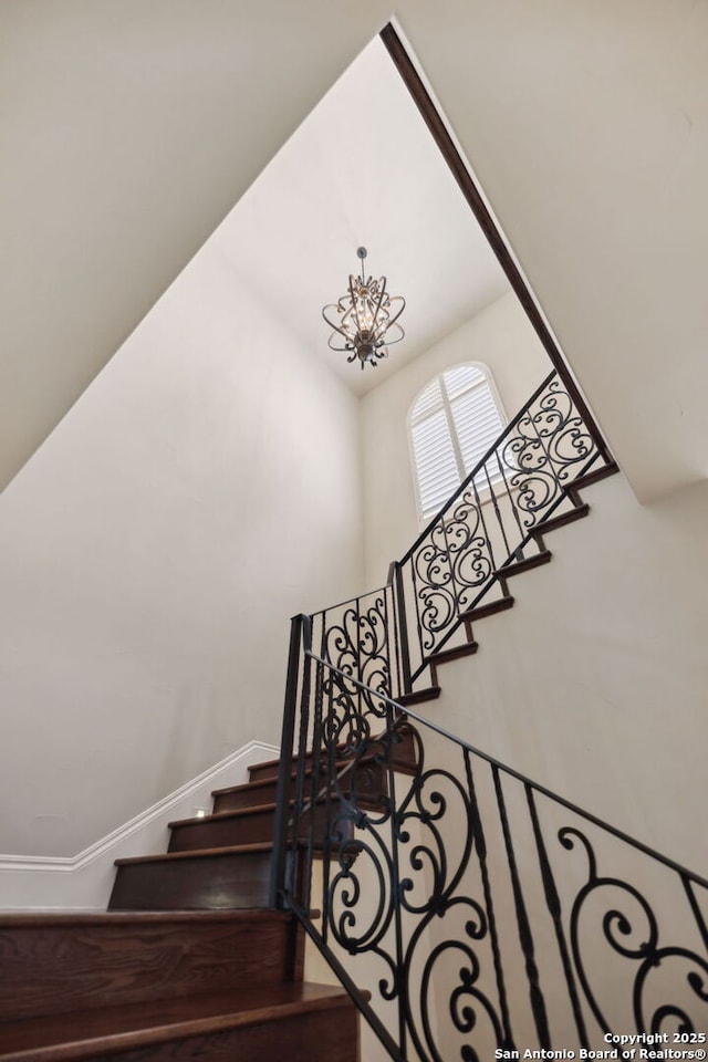 3919 El Chamizal, San Antonio, TX 78261 - stairs with baseboards and a towering ceiling