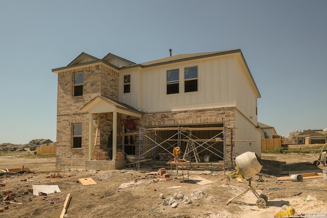 15459 Salmon Spg, San Antonio, TX 78245 - view of front facade featuring brick siding and board and batten siding