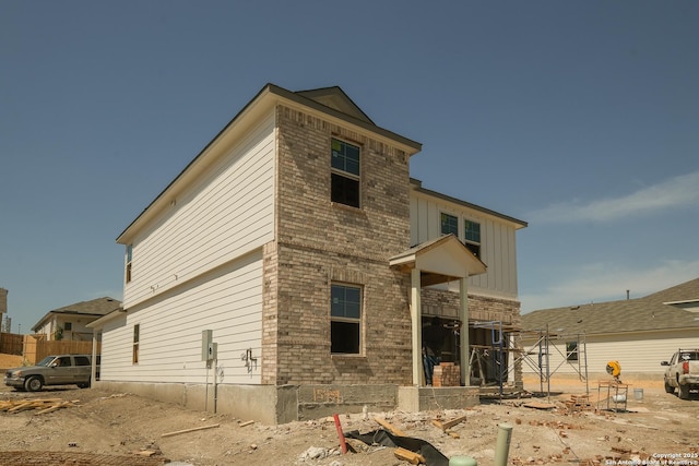 15459 Salmon Spg, San Antonio, TX 78245 - rear view of house with board and batten siding