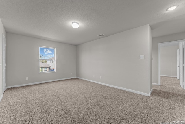 1542 Silver Run, New Braunfels, TX 78130 - unfurnished room with carpet, a textured ceiling, and baseboards
