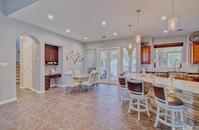 2110 Winding Vw, San Antonio, TX 78260 - kitchen featuring decorative backsplash, french doors, and recessed lighting