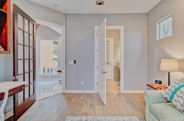 2110 Winding Vw, San Antonio, TX 78260 - interior space featuring baseboards, visible vents, wood finished floors, and french doors