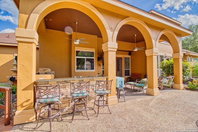 2110 Winding Vw, San Antonio, TX 78260 - view of patio / terrace with outdoor wet bar and a ceiling fan