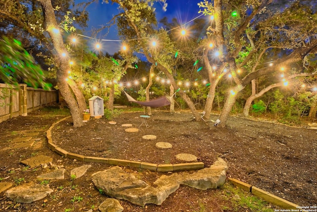 2110 Winding Vw, San Antonio, TX 78260 - yard at twilight with an outbuilding and fence