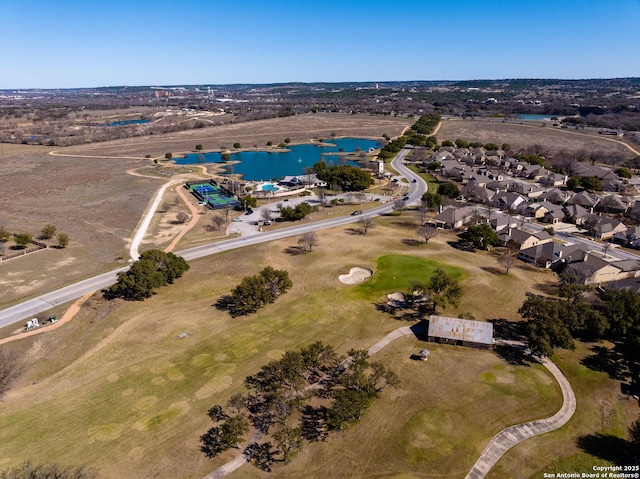 birds eye view of property featuring a residential view, golf course view, and a water view