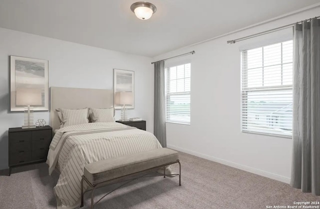 bedroom with baseboards and carpet floors