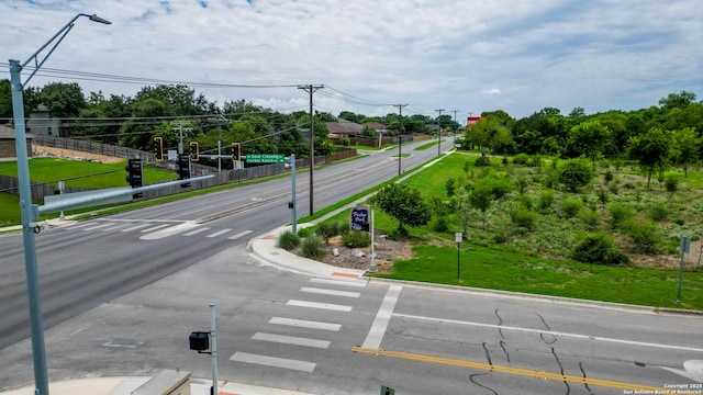 view of road featuring curbs