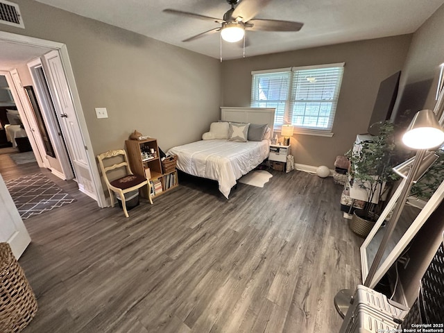 3401 Sugarhill, San Antonio, TX 78230 - bedroom featuring baseboards, ceiling fan, visible vents, and wood finished floors