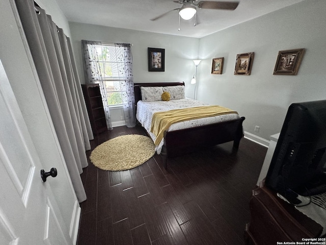 3401 Sugarhill, San Antonio, TX 78230 - bedroom featuring baseboards, dark wood-style flooring, and a ceiling fan