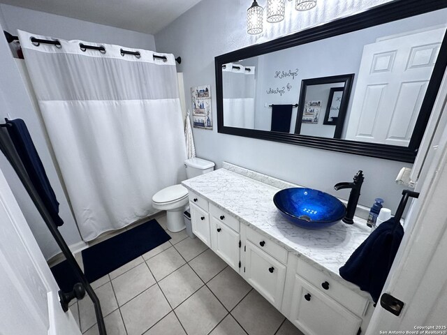 3401 Sugarhill, San Antonio, TX 78230 - bathroom featuring a shower with curtain, tile patterned floors, toilet, and vanity