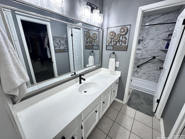 3401 Sugarhill, San Antonio, TX 78230 - bathroom with tile patterned flooring, walk in shower, vanity, a textured wall, and a spacious closet