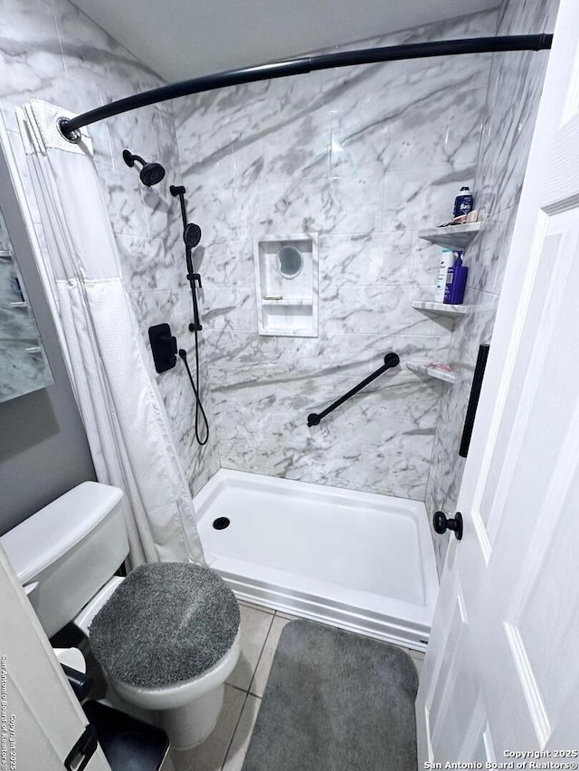 3401 Sugarhill, San Antonio, TX 78230 - full bathroom featuring a stall shower, toilet, and tile patterned flooring