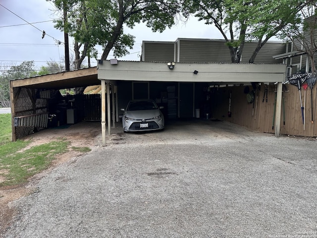 3401 Sugarhill, San Antonio, TX 78230 - garage featuring driveway and an attached carport