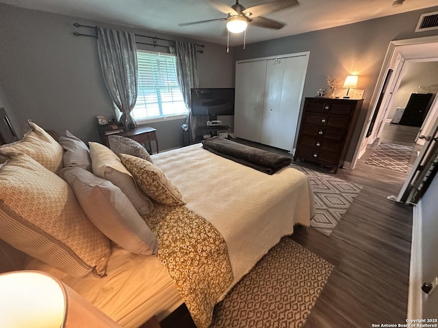 3401 Sugarhill, San Antonio, TX 78230 - bedroom featuring a ceiling fan, wood finished floors, a closet, and visible vents