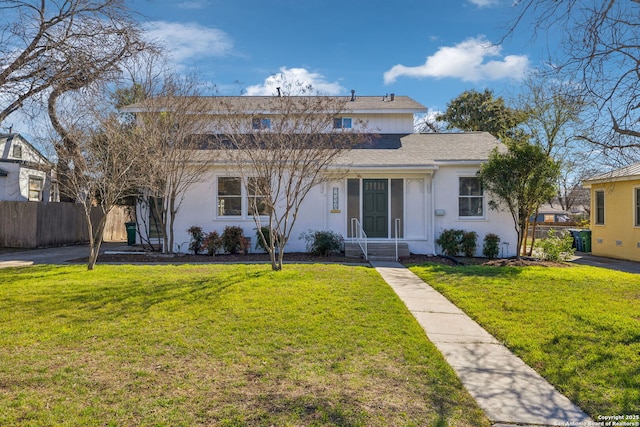 2334 W Huisache, San Antonio, TX 78201 - traditional home featuring a shingled roof, stucco siding, fence, and a front lawn