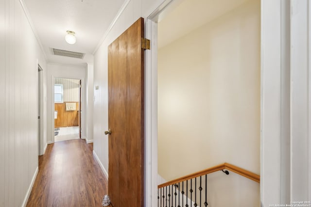 2334 W Huisache, San Antonio, TX 78201 - corridor featuring an upstairs landing, dark wood finished floors, baseboards, visible vents, and ornamental molding