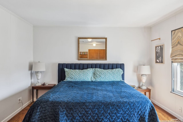 2334 W Huisache, San Antonio, TX 78201 - bedroom featuring baseboards, ornamental molding, and wood finished floors