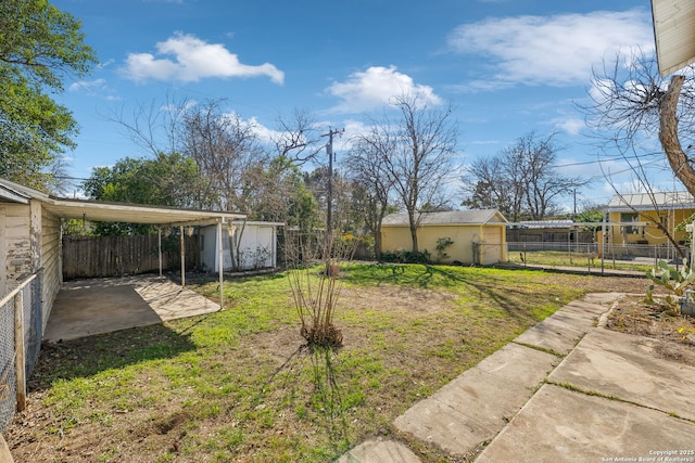 2334 W Huisache, San Antonio, TX 78201 - view of yard with fence, an outdoor structure, and a shed
