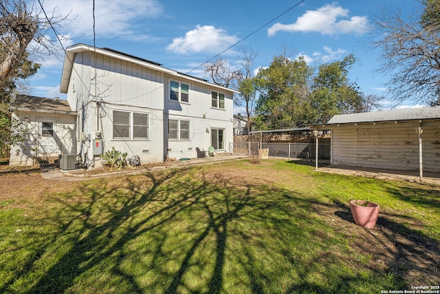 2334 W Huisache, San Antonio, TX 78201 - back of house featuring central AC unit, entry steps, fence, and a yard