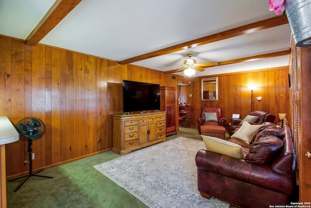 3422 William Penn Dr, San Antonio, TX 78230 - living room with wood walls, carpet flooring, baseboards, beam ceiling, and ceiling fan