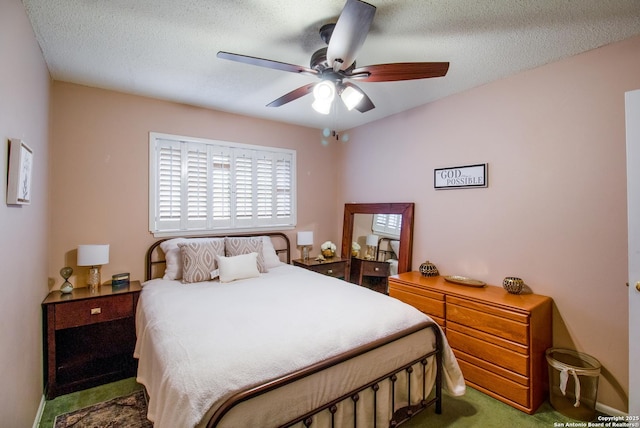 3422 William Penn Dr, San Antonio, TX 78230 - carpeted bedroom with a ceiling fan and a textured ceiling