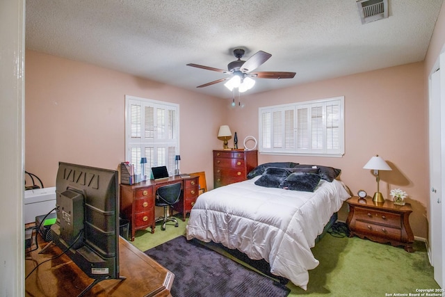3422 William Penn Dr, San Antonio, TX 78230 - bedroom featuring carpet floors, a textured ceiling, and visible vents