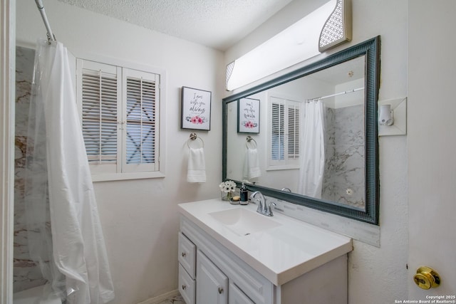 3422 William Penn Dr, San Antonio, TX 78230 - bathroom featuring vanity, a textured ceiling, and curtained shower