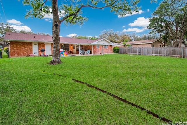 3422 William Penn Dr, San Antonio, TX 78230 - view of yard with a fenced backyard and a patio area