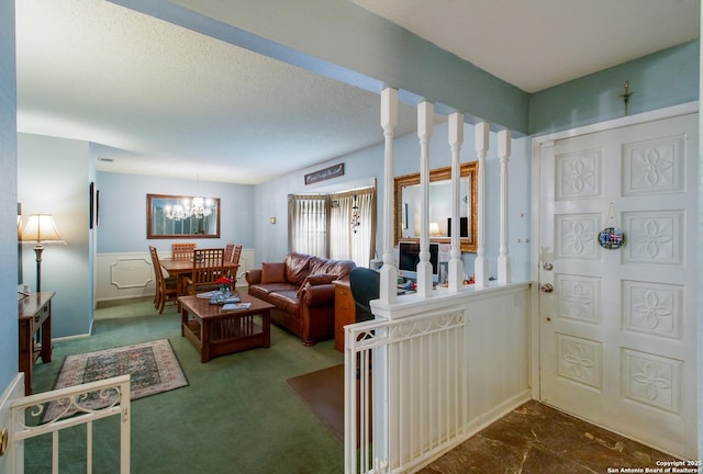 3422 William Penn Dr, San Antonio, TX 78230 - living room featuring a textured ceiling and an inviting chandelier