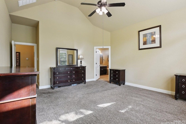 carpeted bedroom with ensuite bath, visible vents, high vaulted ceiling, and baseboards
