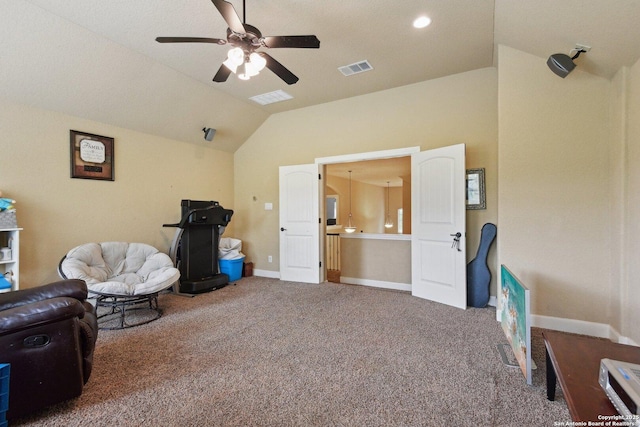 sitting room featuring visible vents, ceiling fan, carpet flooring, and vaulted ceiling