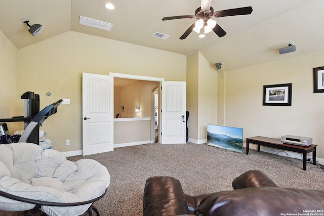 living room featuring visible vents, a ceiling fan, carpet, and lofted ceiling