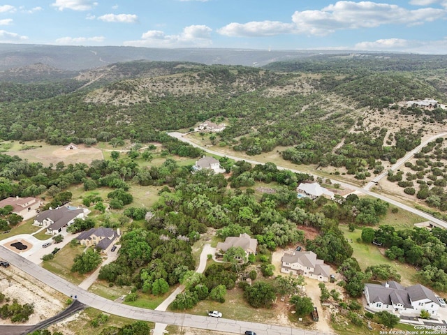 drone / aerial view featuring a mountain view and a residential view