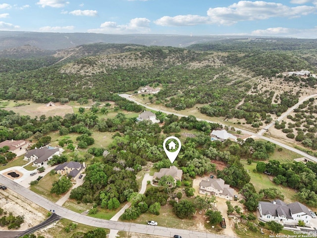 birds eye view of property with a residential view and a mountain view