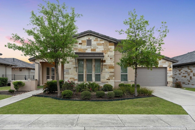 6743 Bella Colina, San Antonio, TX 78256 - view of front of home featuring stone siding, a front yard, concrete driveway, and an attached garage