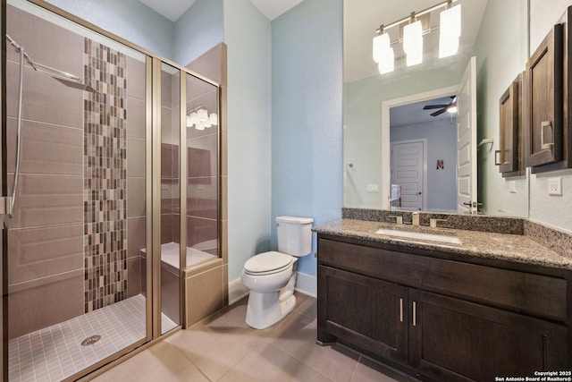 6743 Bella Colina, San Antonio, TX 78256 - full bathroom with vanity, toilet, a shower stall, tile patterned floors, and a ceiling fan