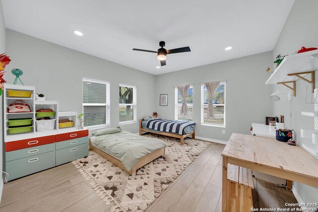 bedroom featuring baseboards, ceiling fan, recessed lighting, and light wood-style floors