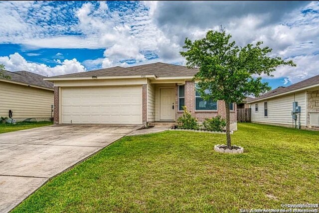 San Antonio, TX 78245 - ranch-style house with a front lawn, driveway, an attached garage, and brick siding