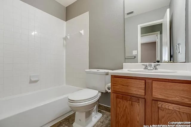 San Antonio, TX 78245 - full bathroom featuring tile patterned floors, toilet, vanity, shower / washtub combination, and visible vents