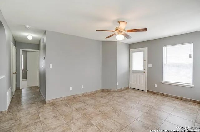 San Antonio, TX 78245 - empty room featuring baseboards and ceiling fan