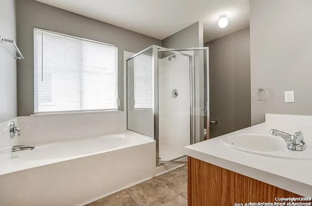 San Antonio, TX 78245 - bathroom with a garden tub, a stall shower, tile patterned floors, and vanity