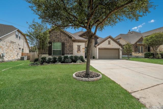 6114 Amber Rose, San Antonio, TX 78253 - view of front facade featuring a front yard, brick siding, central AC unit, an attached garage, and driveway