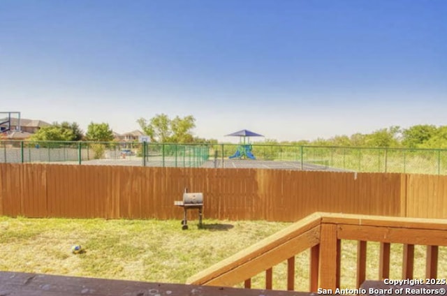 view of yard featuring fence