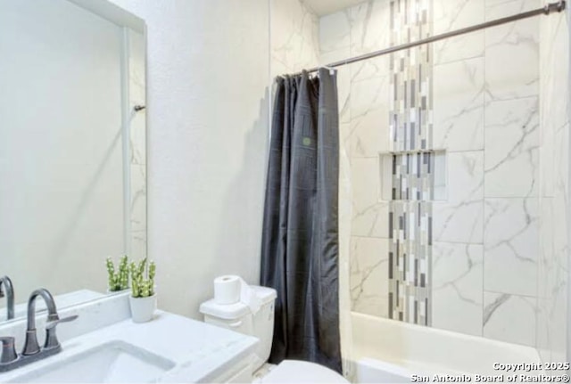 bathroom with toilet, vanity, and shower / bathtub combination with curtain