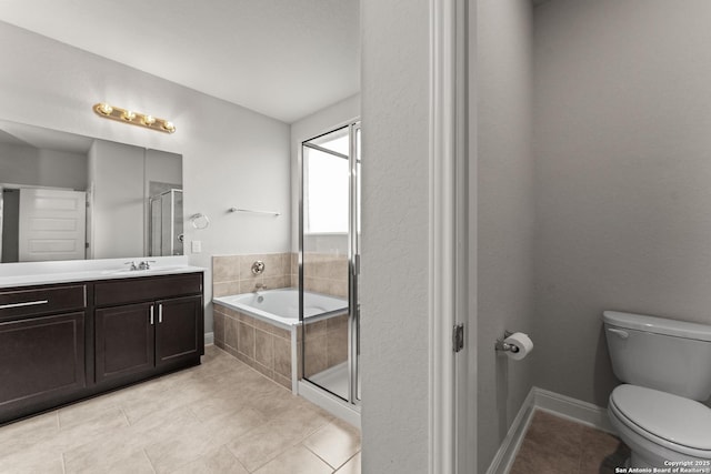 217 Blaze Moon, Cibolo, TX 78108 - bathroom featuring toilet, vanity, a garden tub, tile patterned floors, and a shower with shower door