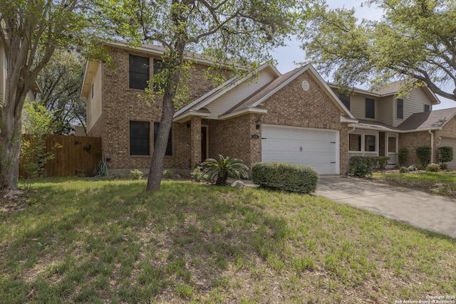 traditional home with fence, an attached garage, concrete driveway, brick siding, and a front lawn