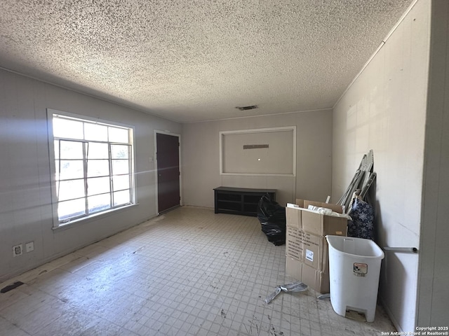 4535 Lark, San Antonio, TX 78228 - empty room featuring a textured ceiling
