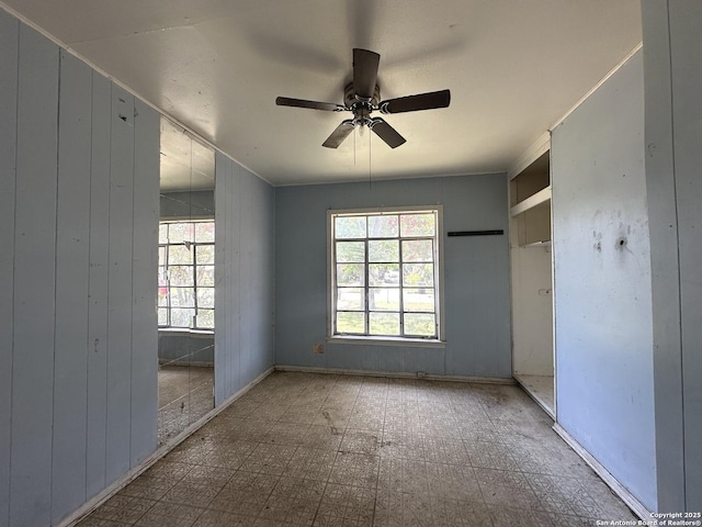 4535 Lark, San Antonio, TX 78228 - unfurnished bedroom featuring tile patterned floors and a ceiling fan