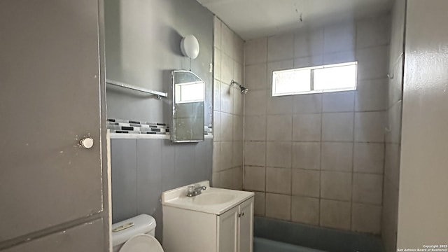 4535 Lark, San Antonio, TX 78228 - full bath with toilet, vanity, and shower / bathtub combination