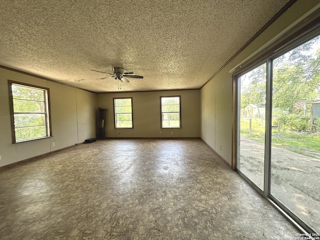 4535 Lark, San Antonio, TX 78228 - unfurnished room with a textured ceiling and ceiling fan